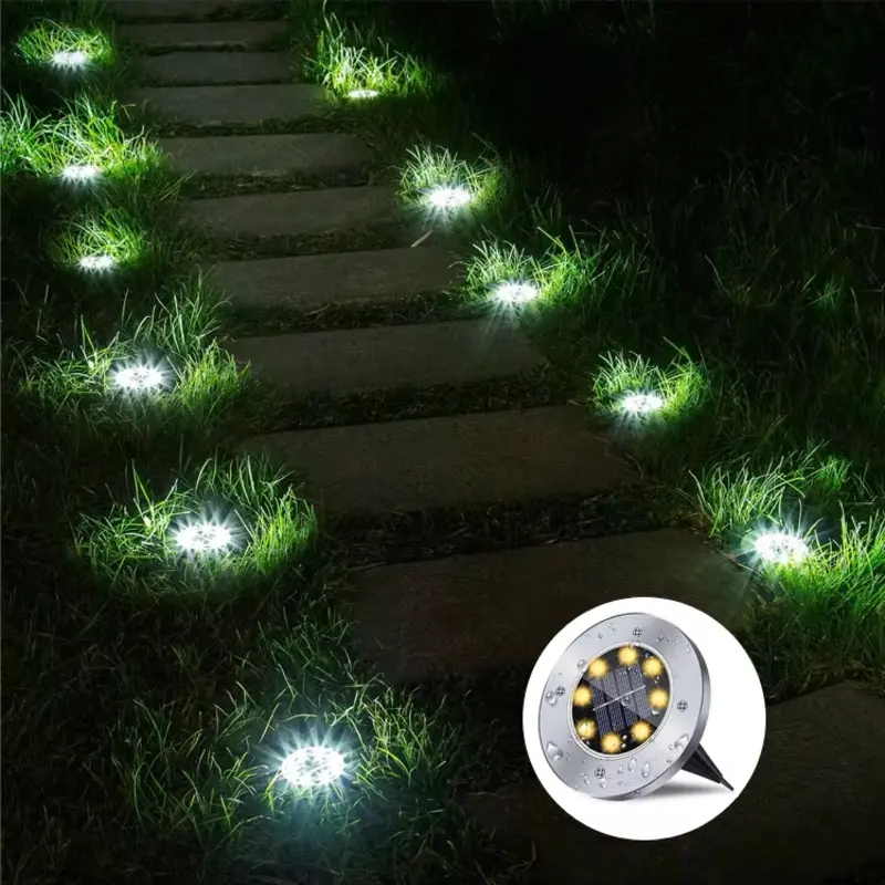 Moderne solarne ubodne disk lampe koje se savršeno uklapaju u svako dvorište i pružaju elegantno belo osvetljenje za staze prilaze i travnjake